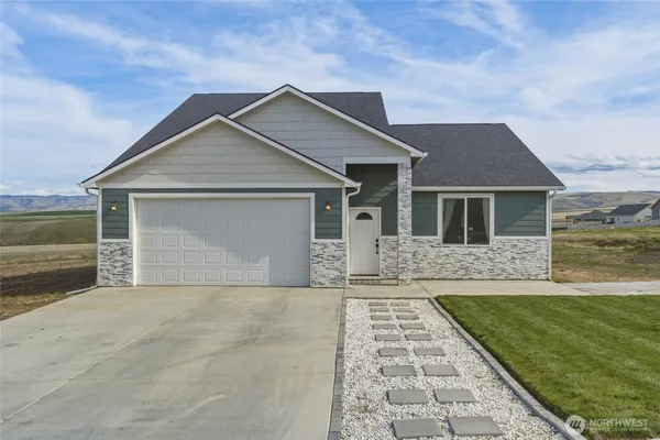 front view of house with a yard