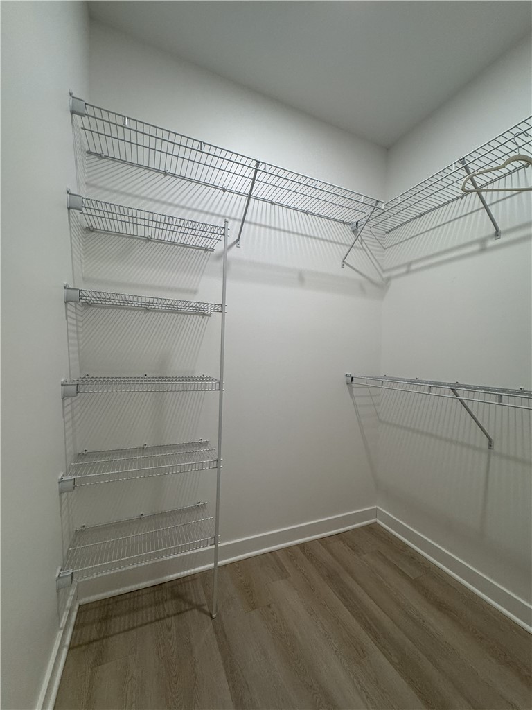 410 Erie Rdg Drive Henrietta, NY 14467 - Photo 10 of 13 Typical primary bedroom walk-in closet