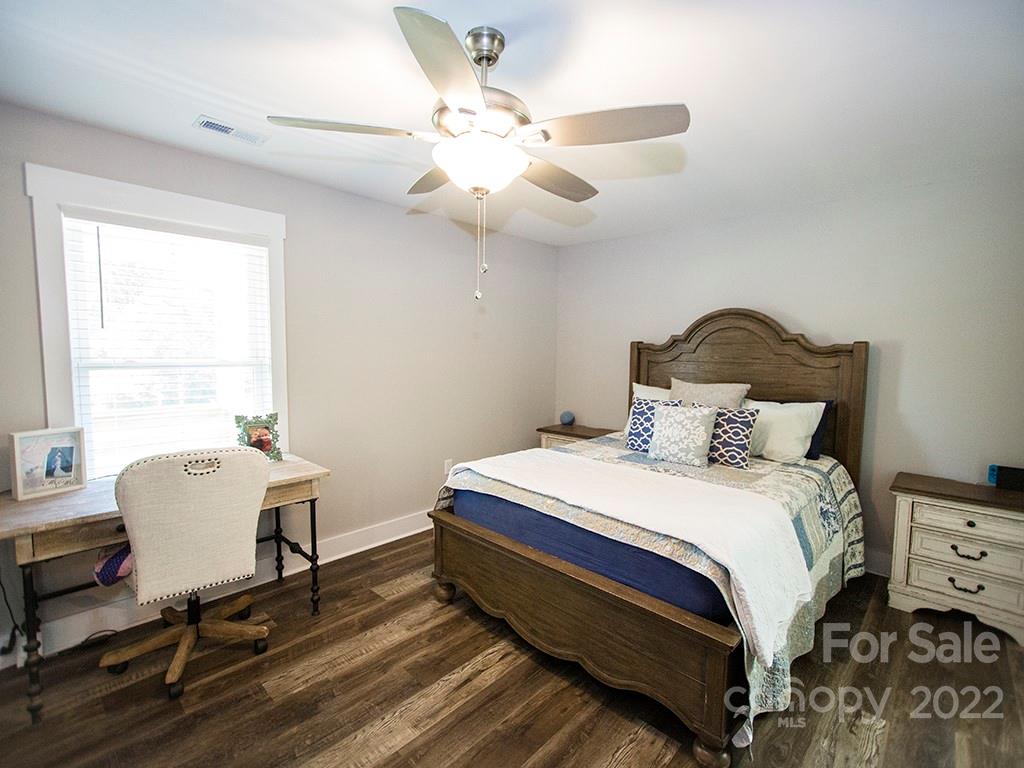 1350 Miles Road Dallas, NC 28034 - Photo 12 of 17 a bed room with a bed and a chair