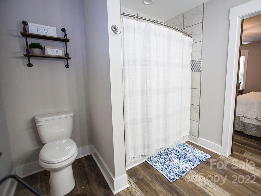 1350 Miles Road Dallas, NC 28034 - Photo 15 of 17 a bathroom with a toilet and a shower