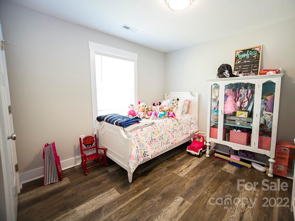 1350 Miles Road Dallas, NC 28034 - Photo 16 of 17 a bed room with a bed and a window