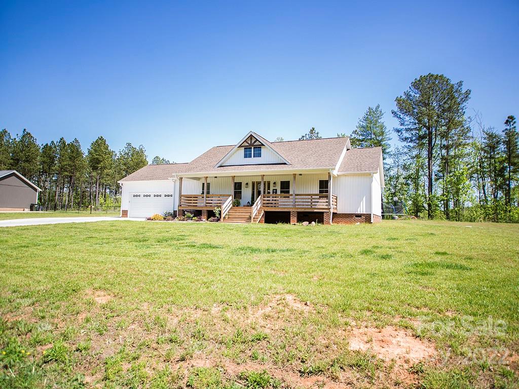 1350 Miles Road Dallas, NC 28034 - Photo 5 of 17 a front view of house with garden