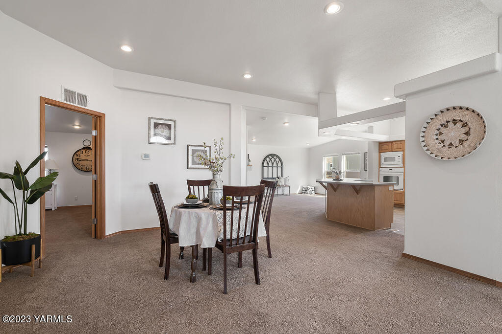 1305 Faucher Road Moxee, WA 98936 - Photo 11 of 40 a view of a dining room with furniture and window