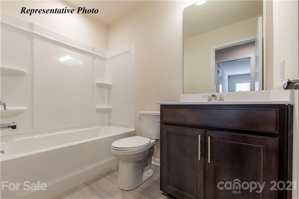 806 Canoe Song Road, Unit 367 Fort Mill, SC 29708 - Photo 11 of 23 a bathroom with a sink a toilet and shower