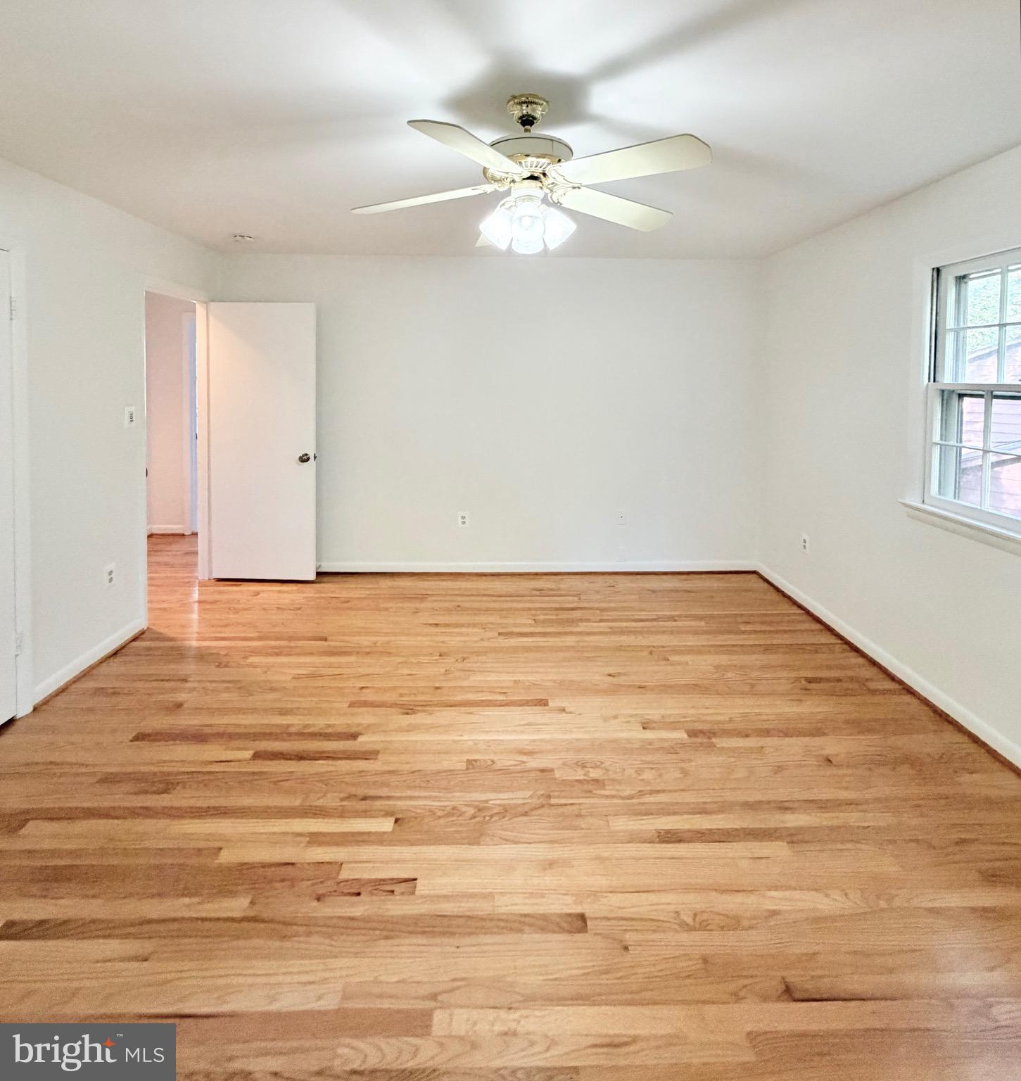9513 Stevebrook Road Fairfax, VA 22032 - Photo 22 of 37 a view of an empty room with window