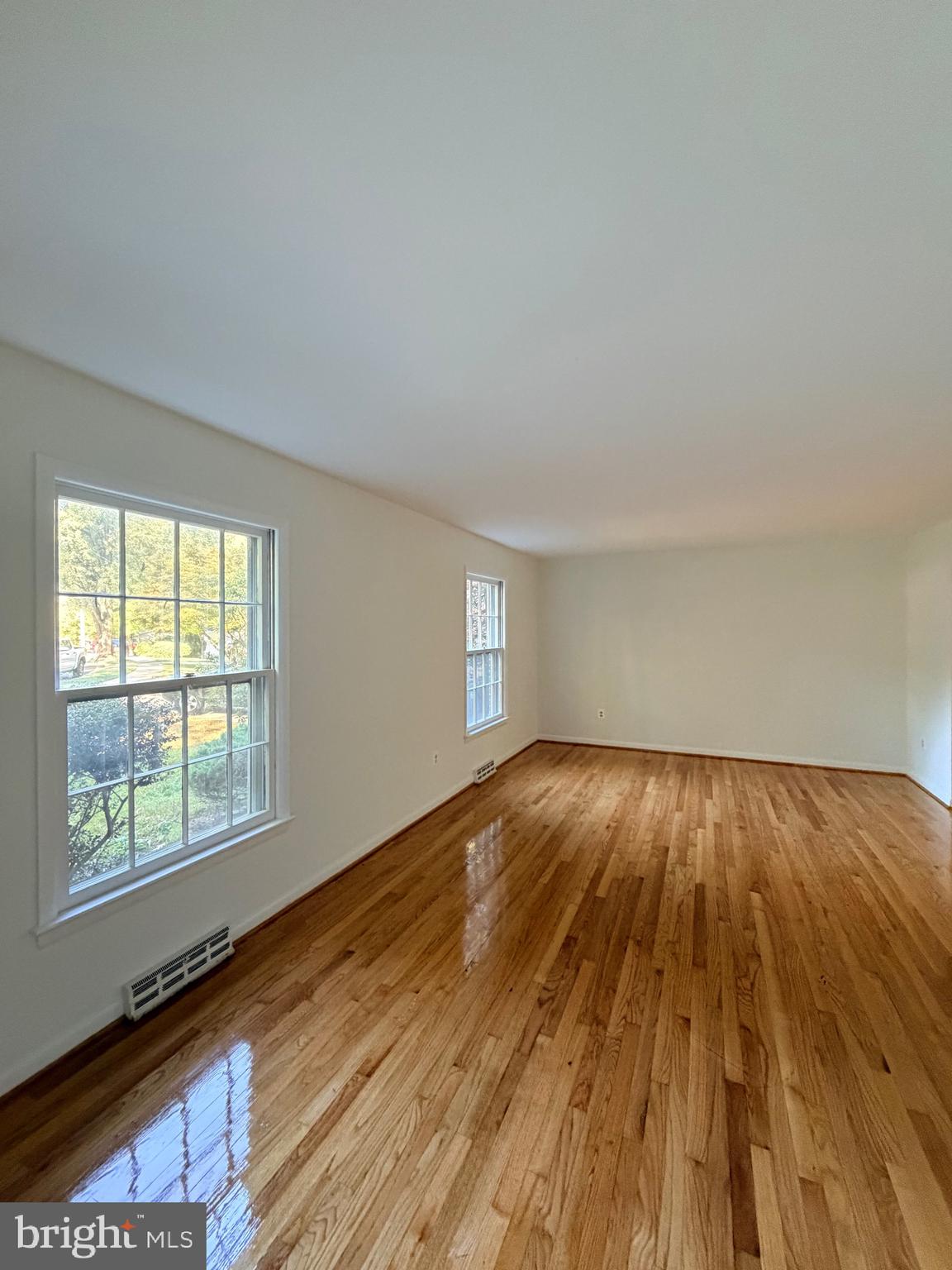 9513 Stevebrook Road Fairfax, VA 22032 - Photo 5 of 37 a view of an empty room and wooden floor
