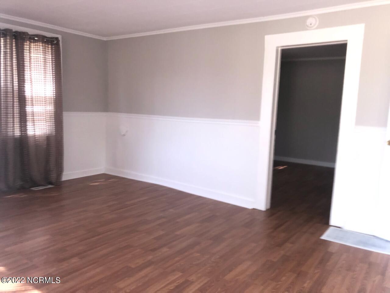 573 East Washington Street Rockingham, NC 28379 - Photo 9 of 18 573 E Washinton St Ext Living Room Pt 3