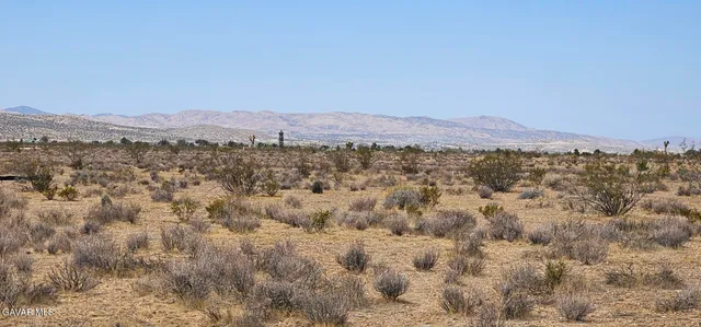 a view of a city with mountain