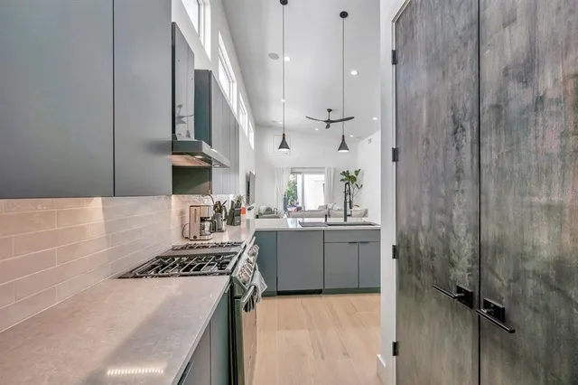 a kitchen with a table and chairs