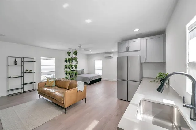 a living room with furniture and a couch