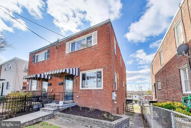 a front view of a house with balcony