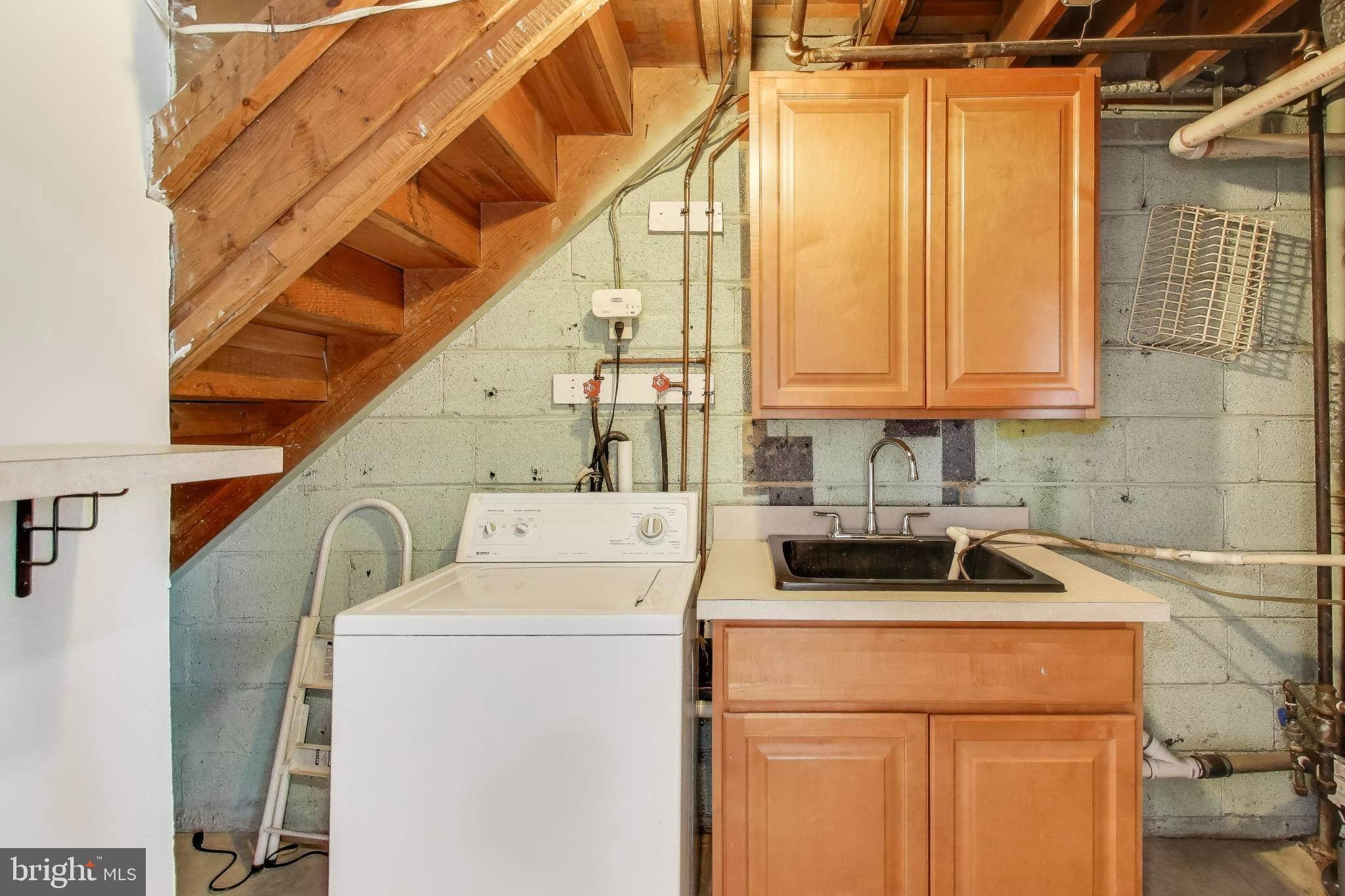 5864 Eastern Avenue Northeast Washington, DC 20011 - Photo 23 of 30 a utility room with dryer and washer