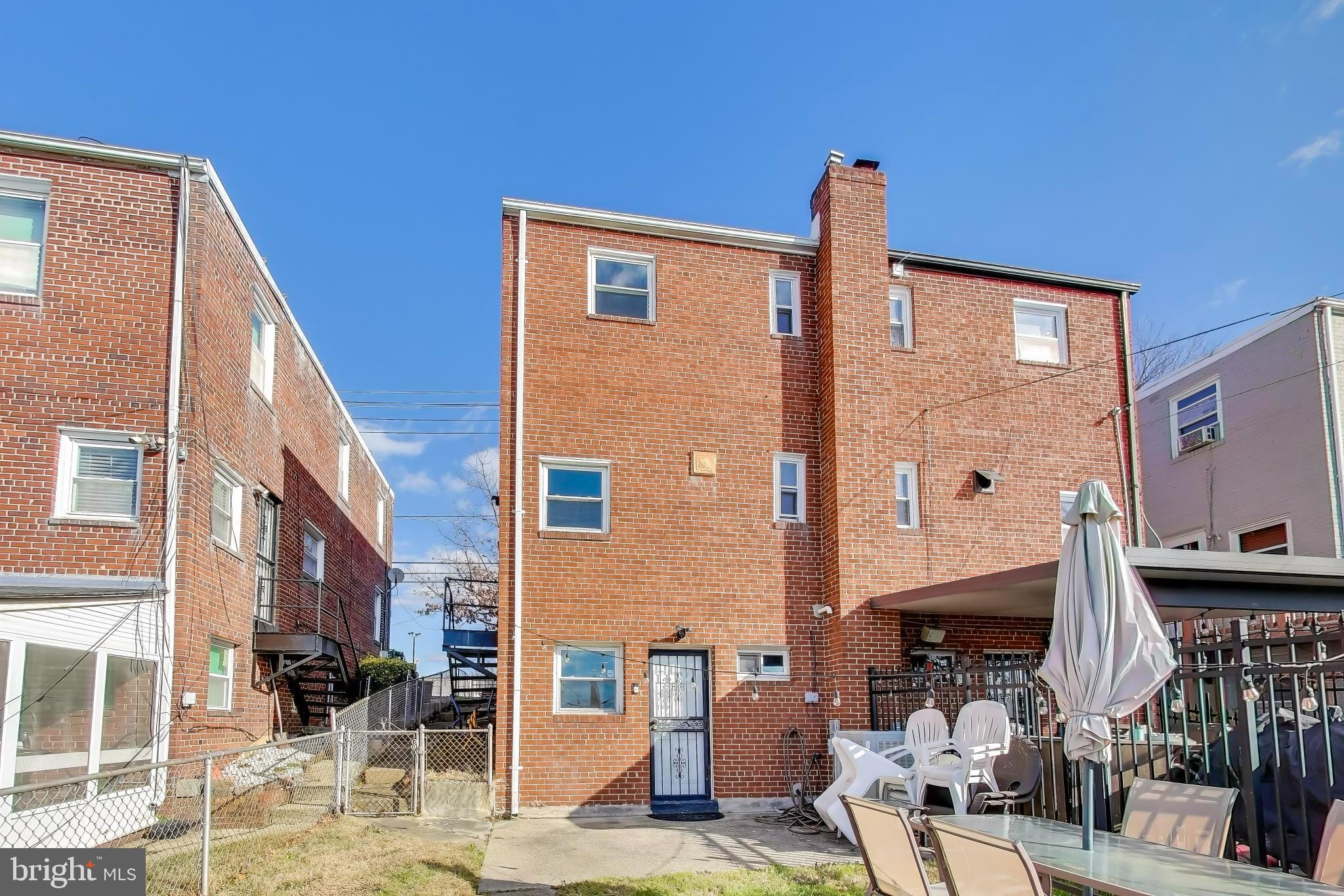 5864 Eastern Avenue Northeast Washington, DC 20011 - Photo 24 of 30 a front view of a building with street view
