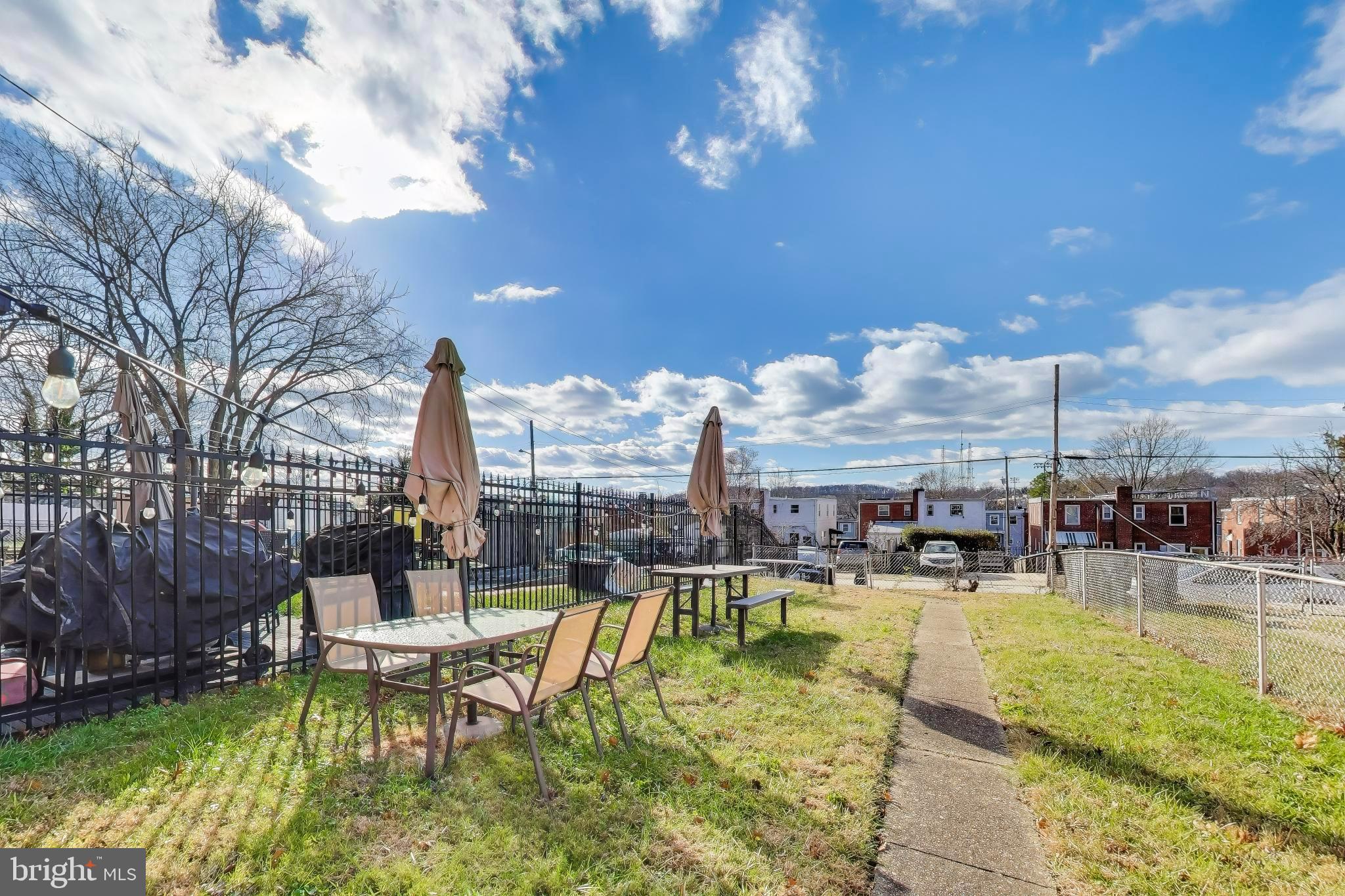 5864 Eastern Avenue Northeast Washington, DC 20011 - Photo 25 of 30 a swimming pool view with a outdoor seating and a garden