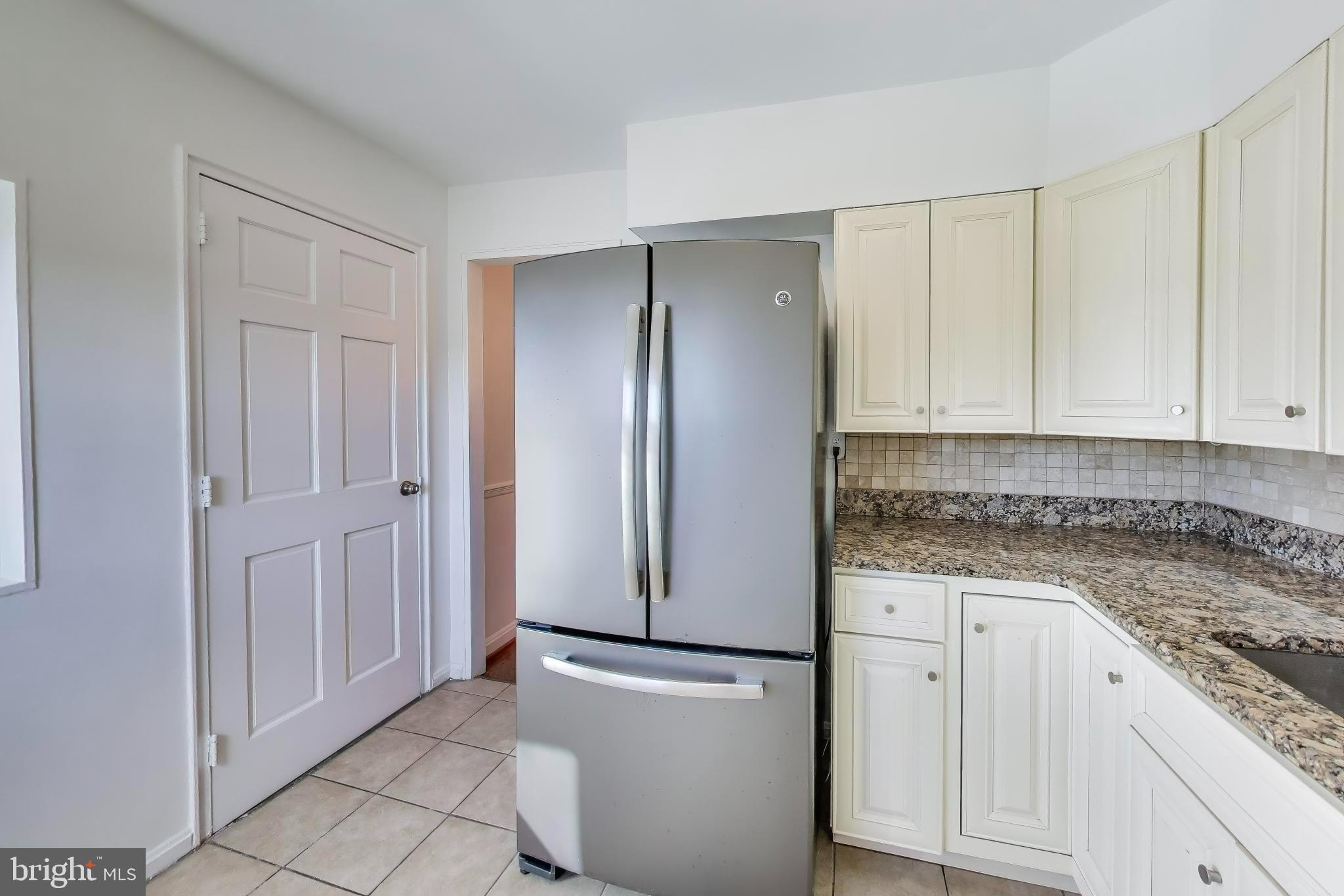 5864 Eastern Avenue Northeast Washington, DC 20011 - Photo 10 of 30 an empty room with wooden floor
