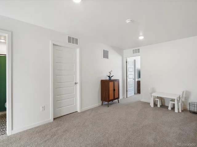 a workspace with a computer on a desk and chair