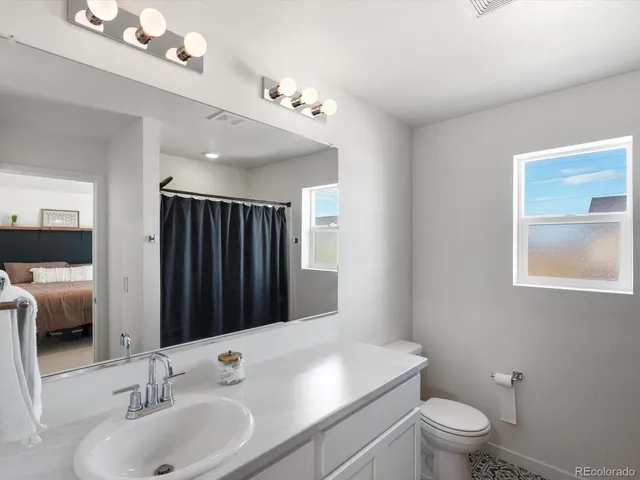 an aerial view of a city with lots of buildings