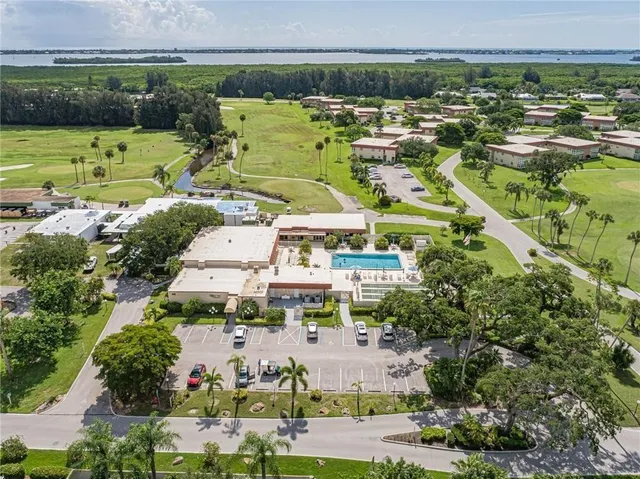 an aerial view of a city with lots of residential buildings swimming pool and outdoor space
