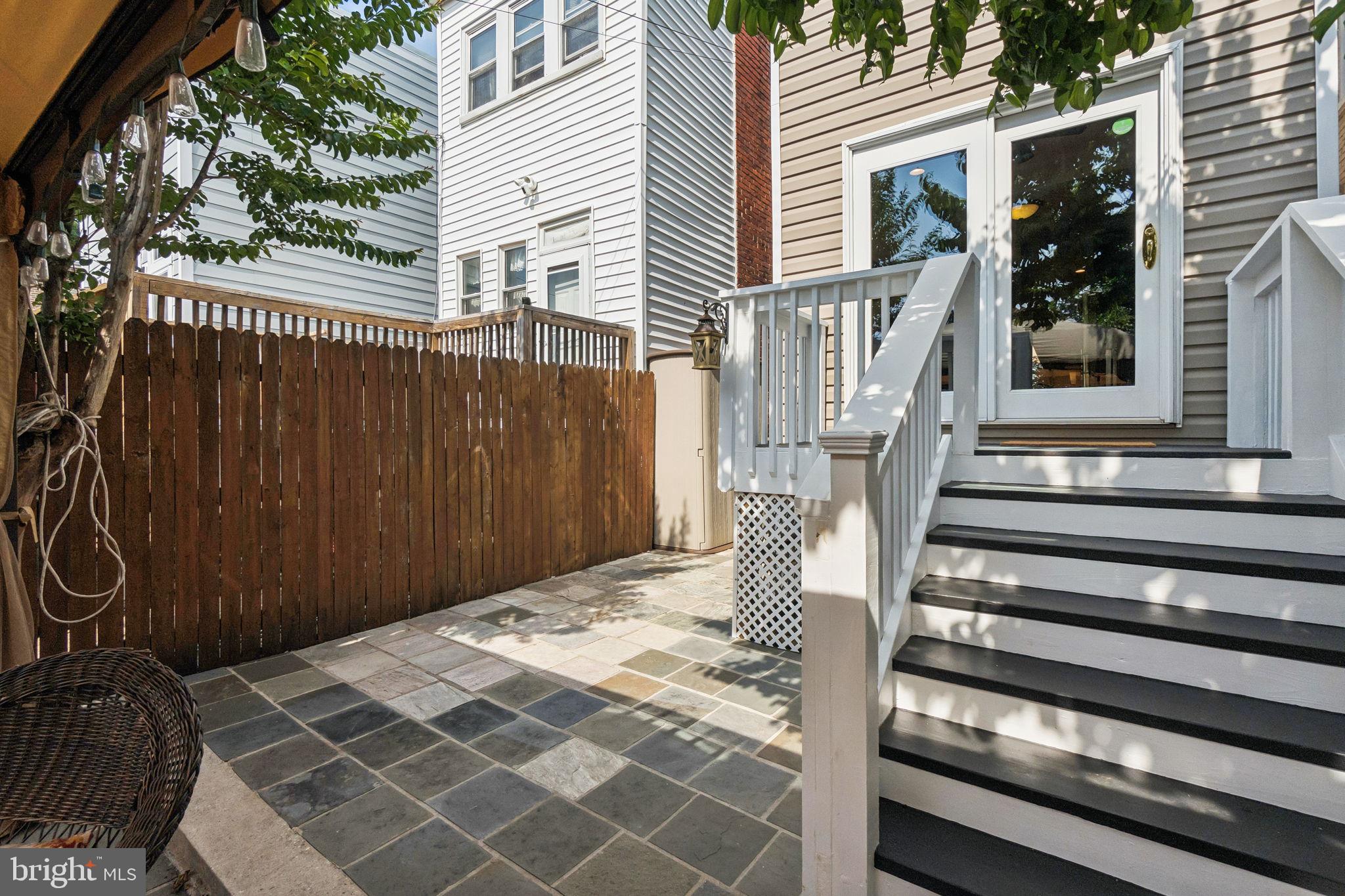 425 16th Street Southeast Washington, DC 20003 - Photo 14 of 58 Deck stepping down to stone patio