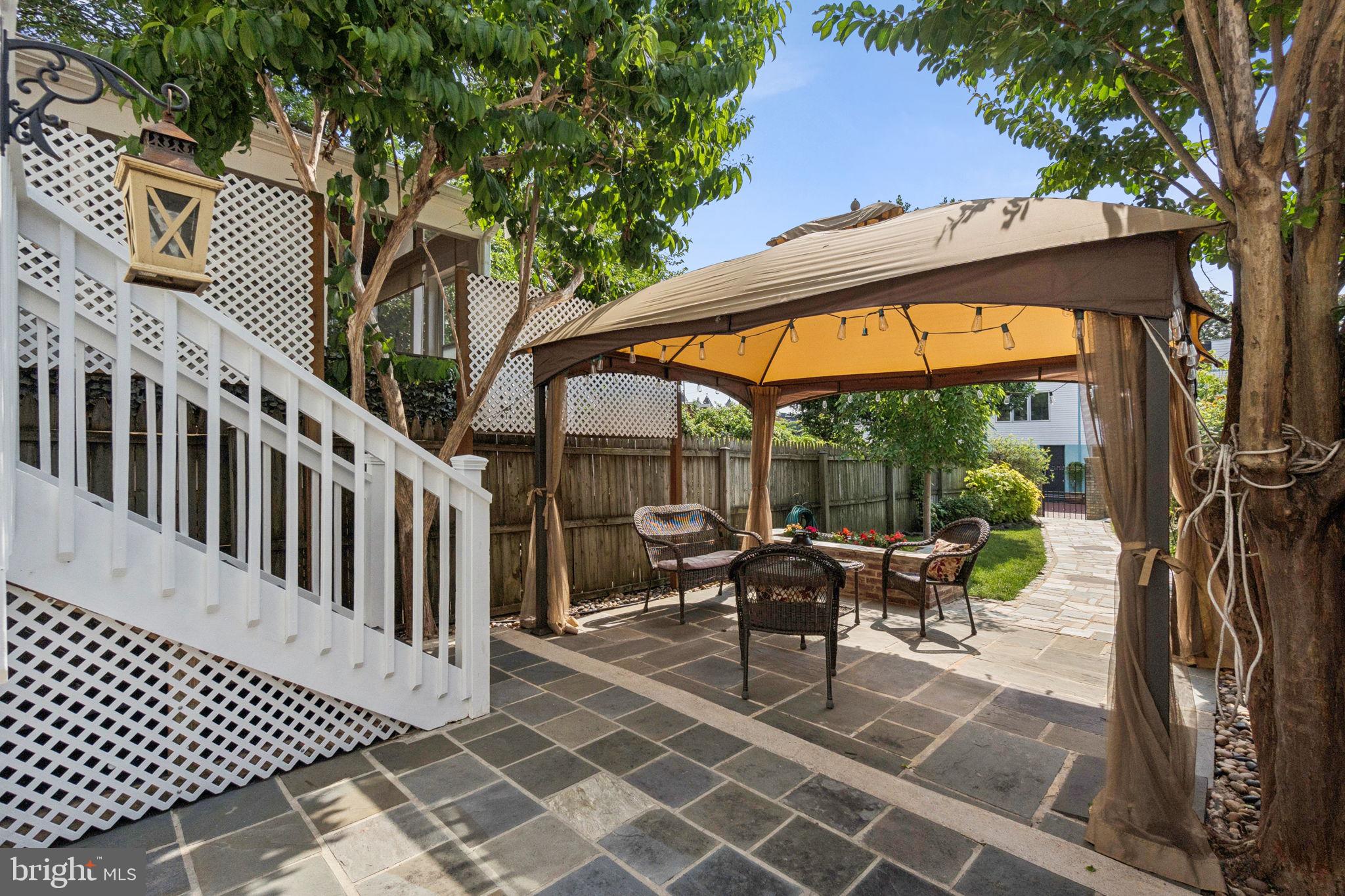 425 16th Street Southeast Washington, DC 20003 - Photo 15 of 58 Stone patio with gazebo, canopy & lights