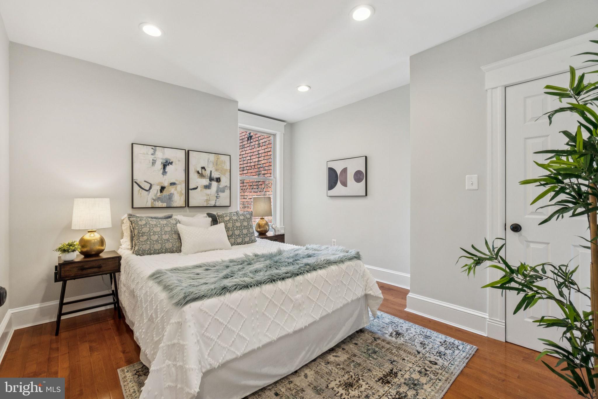 425 16th Street Southeast Washington, DC 20003 - Photo 32 of 58 Middle bedroom with a tall window and closet