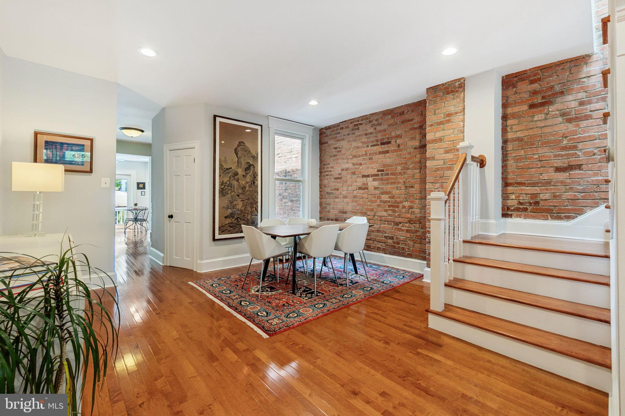 425 16th Street Southeast Washington, DC 20003 - Photo 6 of 58 The dining room has exposed brick