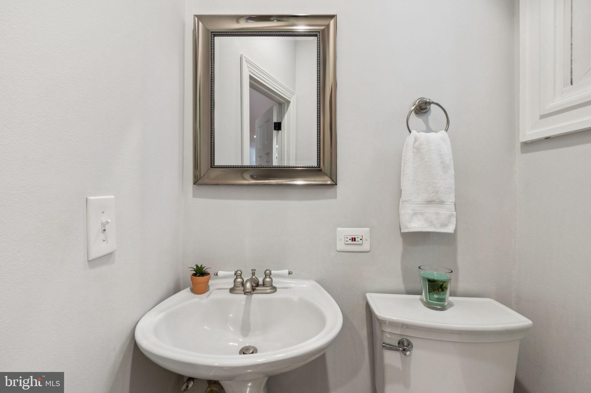 425 16th Street Southeast Washington, DC 20003 - Photo 8 of 58 Convenient main level powder room