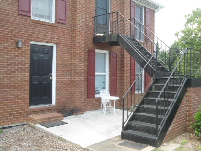1166 Booth Road Southwest, Unit 304 Marietta, GA 30008 - Photo 1 of 1 Great entrance with a welcoming front patio