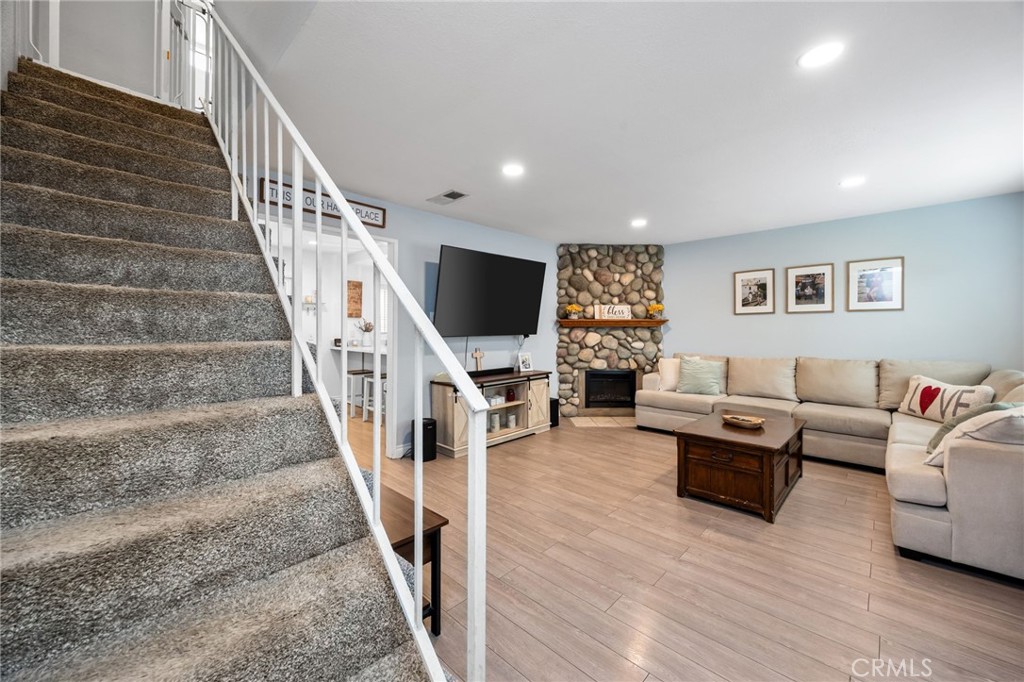 15251 Leffingwell Road, Unit 8 Whittier, CA 90604 - Photo 13 of 30 a living room with furniture and stairs