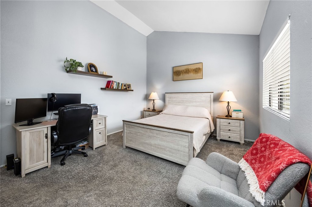 15251 Leffingwell Road, Unit 8 Whittier, CA 90604 - Photo 14 of 30 a bedroom with a bed and furniture