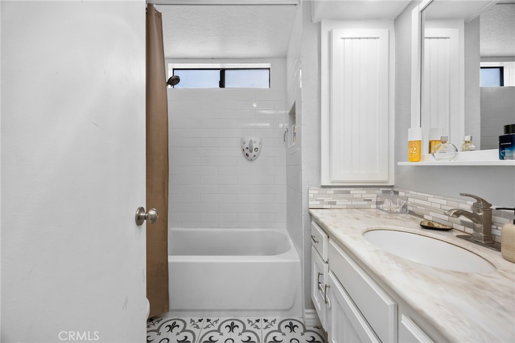 15251 Leffingwell Road, Unit 8 Whittier, CA 90604 - Photo 15 of 30 a bathroom with a sink a toilet and shower