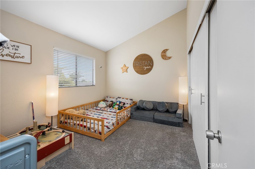 15251 Leffingwell Road, Unit 8 Whittier, CA 90604 - Photo 18 of 30 a bedroom with a bed and a window