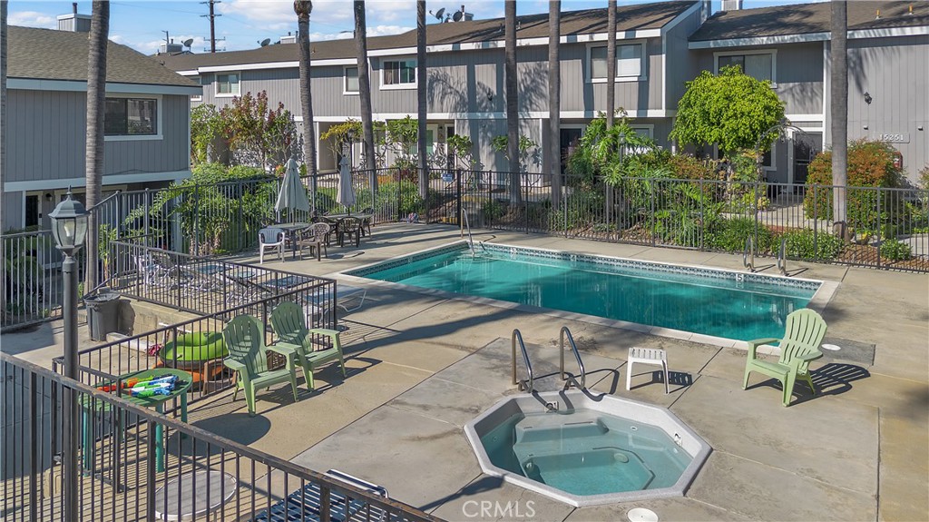 15251 Leffingwell Road, Unit 8 Whittier, CA 90604 - Photo 21 of 26 a patio with glass top table and chairs