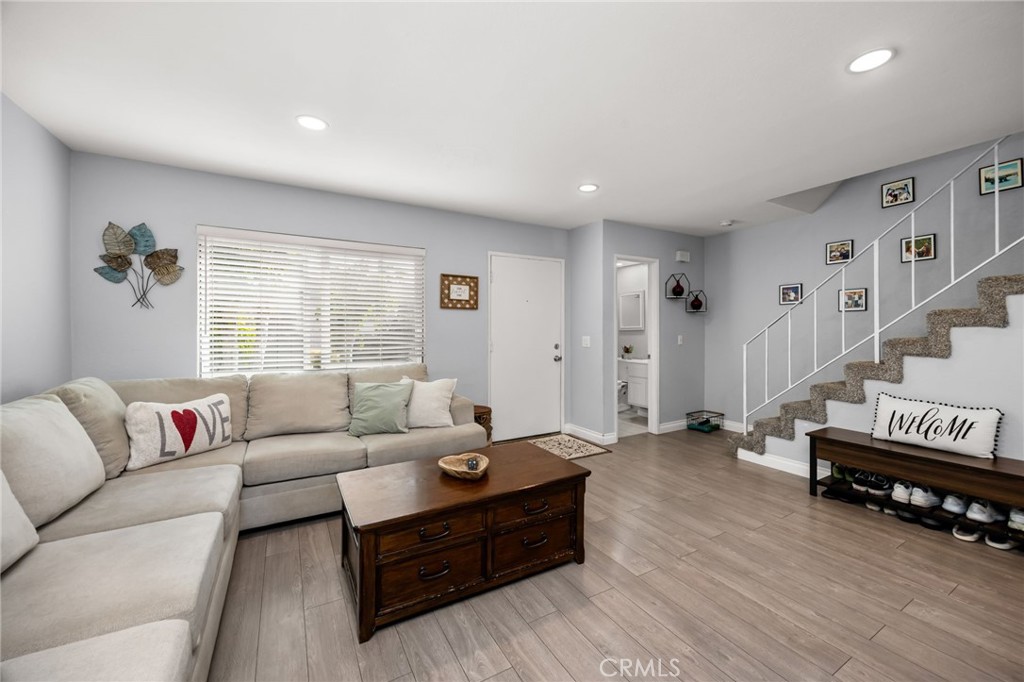 15251 Leffingwell Road, Unit 8 Whittier, CA 90604 - Photo 5 of 30 a living room with furniture and wooden floor