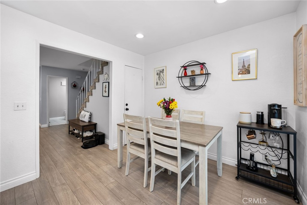 15251 Leffingwell Road, Unit 8 Whittier, CA 90604 - Photo 10 of 30 a room with furniture and a wooden floor