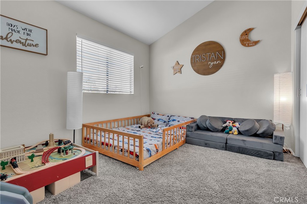 15251 Leffingwell Road, Unit 8 Whittier, CA 90604 - Photo 10 of 26 a living room with furniture gym equipment and window
