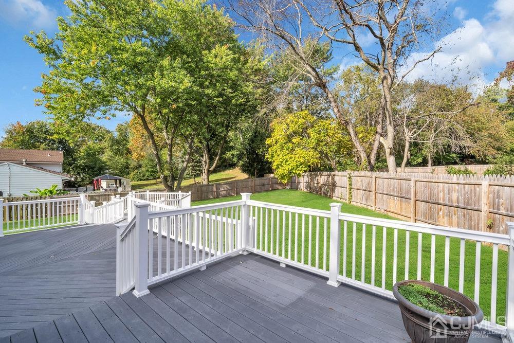 7 Bruning Road East Brunswick, NJ 08816 - Photo 16 of 20 a view of a deck with a large trees