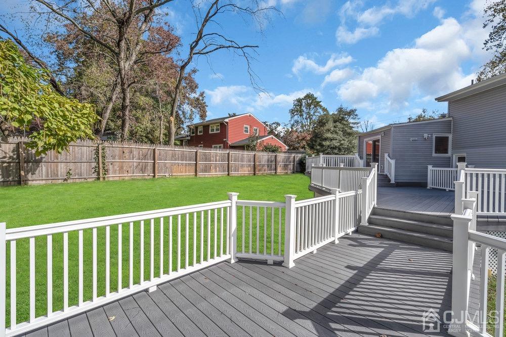 7 Bruning Road East Brunswick, NJ 08816 - Photo 19 of 20 a view of a deck with a yard