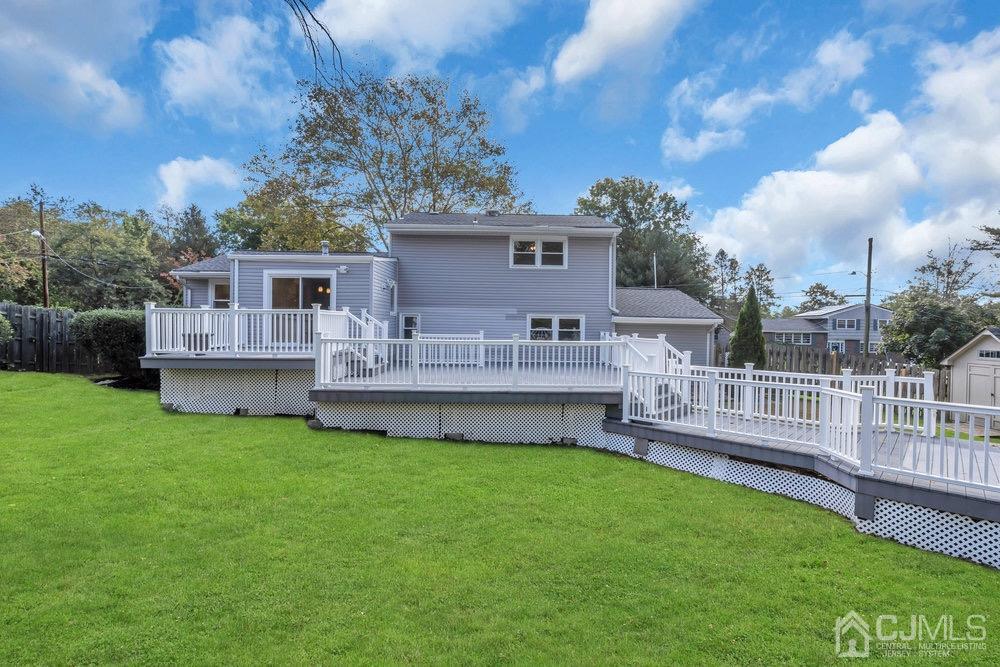 7 Bruning Road East Brunswick, NJ 08816 - Photo 20 of 20 a view of a house with a backyard and a patio
