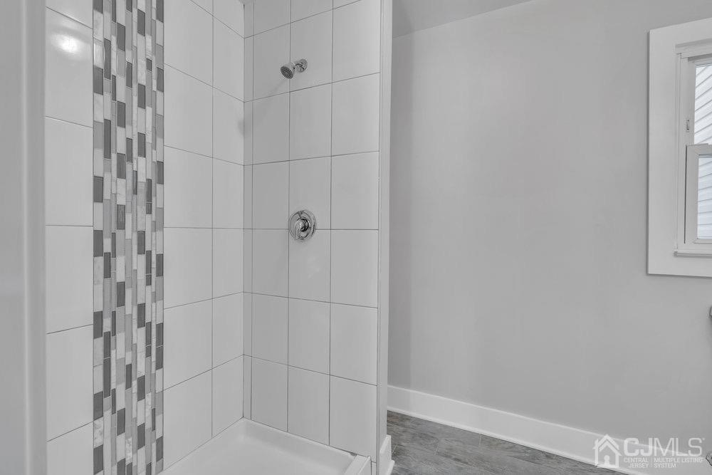 7 Bruning Road East Brunswick, NJ 08816 - Photo 6 of 20 a bathroom with a shower