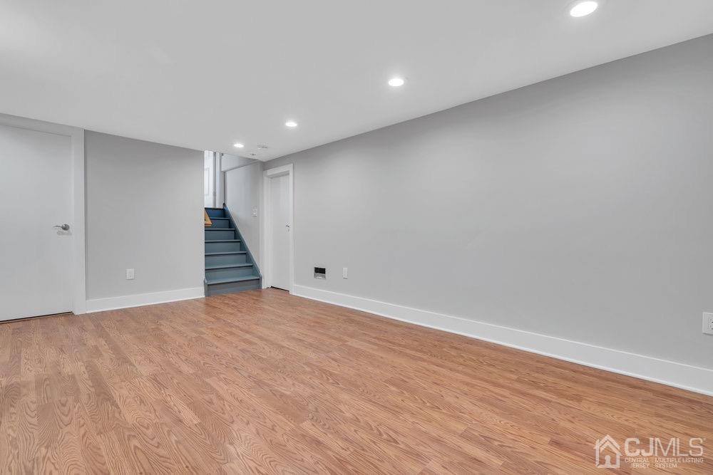 7 Bruning Road East Brunswick, NJ 08816 - Photo 9 of 20 a view of an empty room with stairs and ventilation