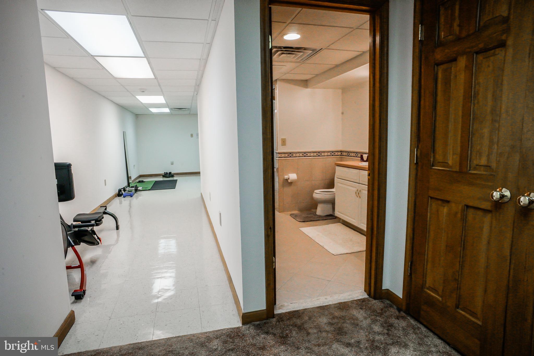 4 Beechwood Circle Chadds Ford, PA 19317 - Photo 102 of 129 Entry to full bathroom and exercise room