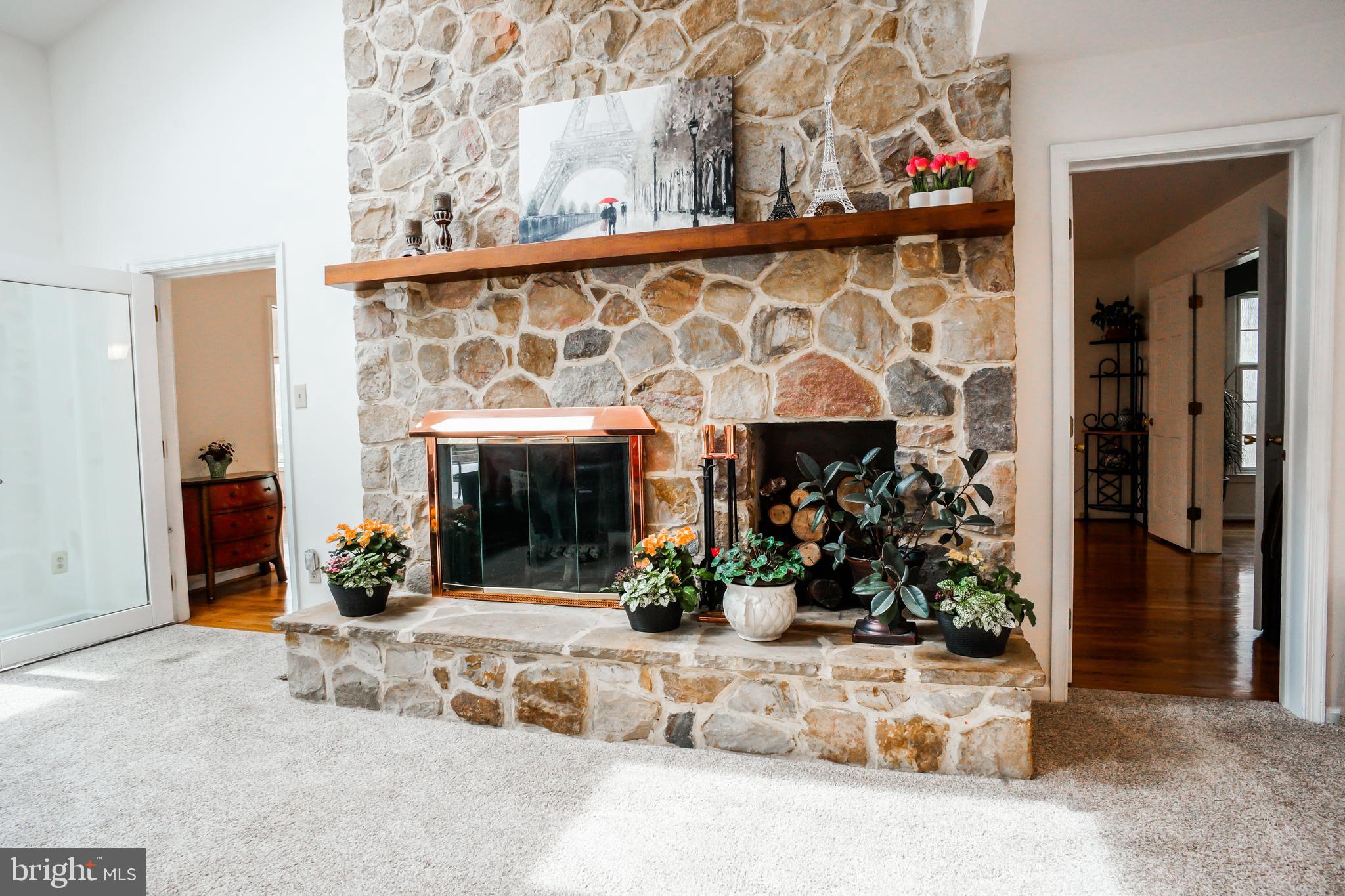 4 Beechwood Circle Chadds Ford, PA 19317 - Photo 19 of 129 2 story stone fireplace