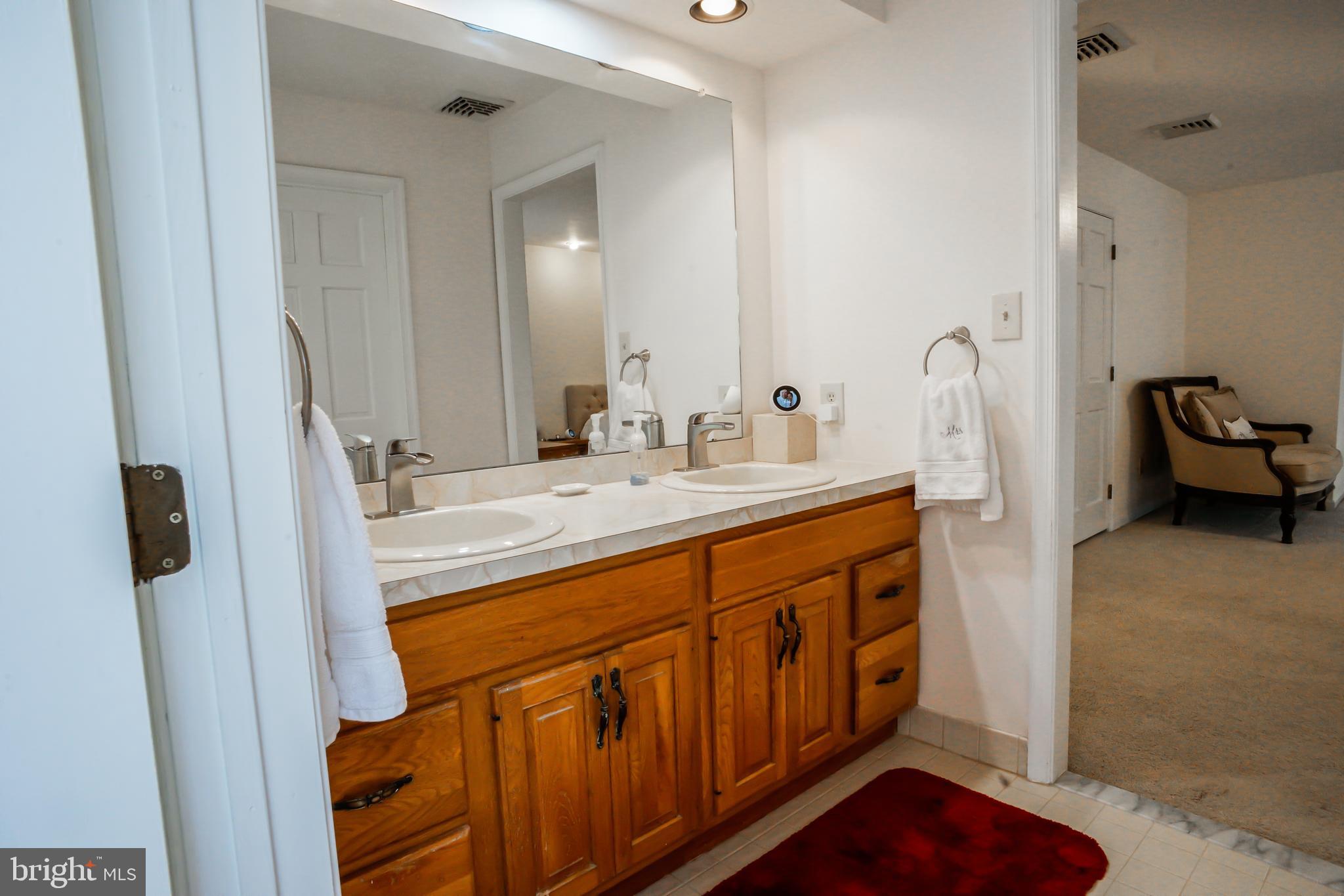 4 Beechwood Circle Chadds Ford, PA 19317 - Photo 57 of 129 Owners bathroom featuring double sink vanity