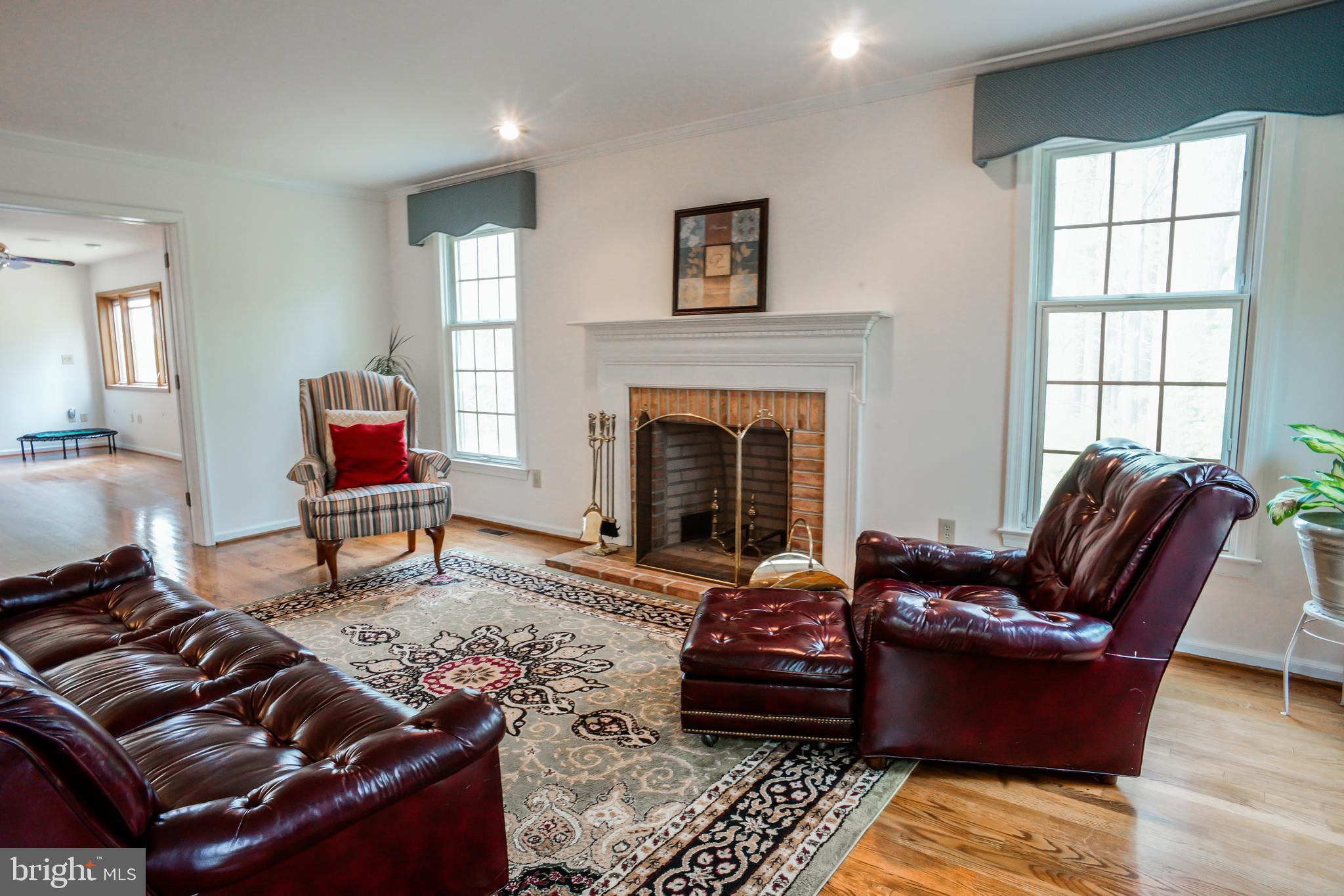 4 Beechwood Circle Chadds Ford, PA 19317 - Photo 7 of 129 Featuring a beautiful fireplace
