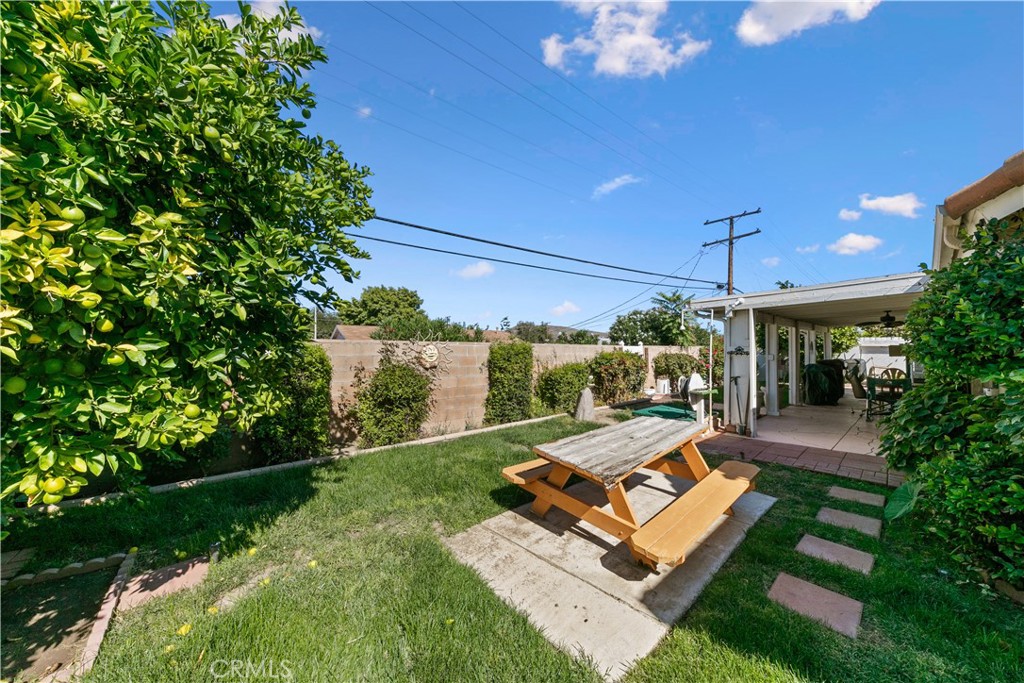 26592 Braddock Road Menifee, CA 92586 - Photo 23 of 23 a view of a house with backyard porch and sitting area