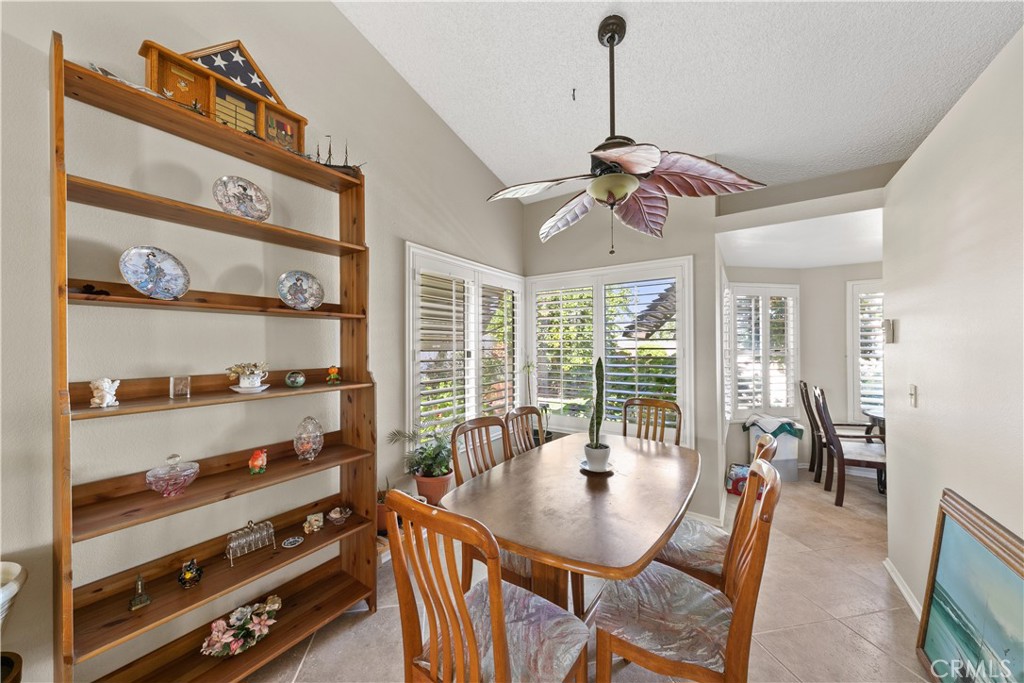 26592 Braddock Road Menifee, CA 92586 - Photo 6 of 23 a view of a dining room with furniture window and outside view