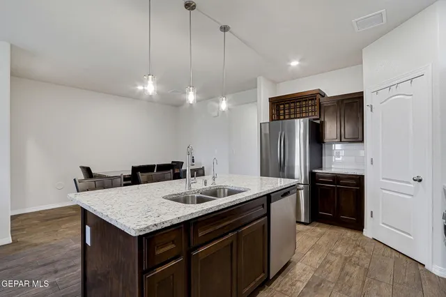 a view of a livingroom with furniture and a window