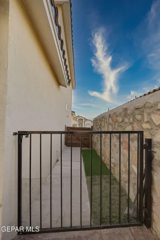 a view of a house with a yard porch and sitting area