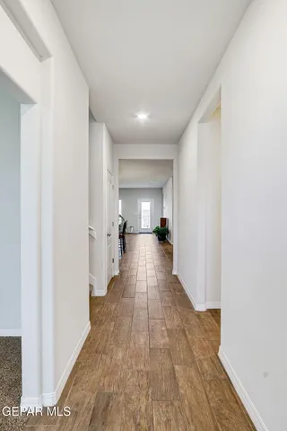 a view of hallway with a couch